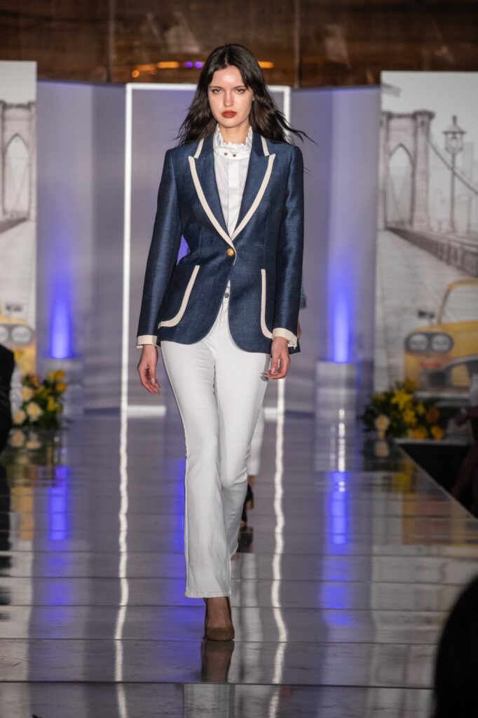 The Extreme Collection USA navy blazer on the runway in Los Angeles