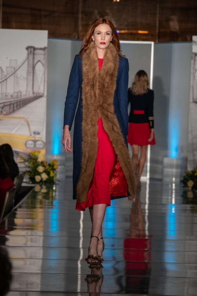 The Extreme Collection USA red and navy blazer on the runway in Los Angeles