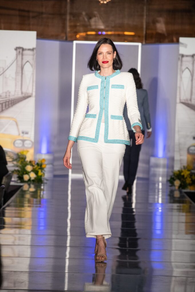 The Extreme Collection USA teal blazer on the runway at Universal Studios Hollywood
